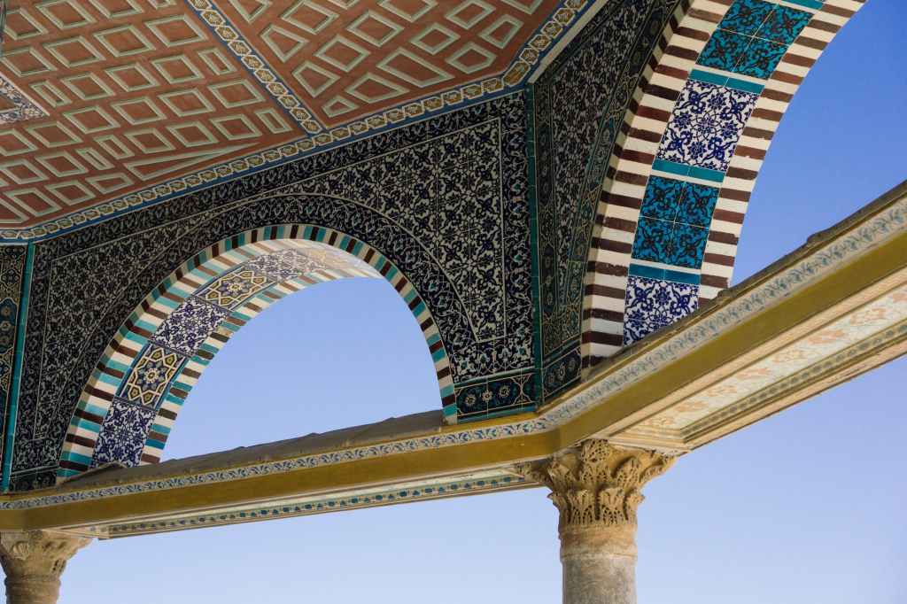 low angle photography of gray and brown concrete building